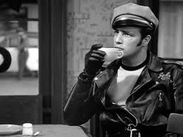 Client's needs: A picture of Marlon Brando wearing his biker cloth and drinking a coffee.